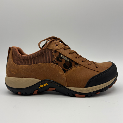 A brown low-top sneaker with a leopard-print pattern panel, black toe cap and outsole, and a beige midsole, shown from the side on a white background.