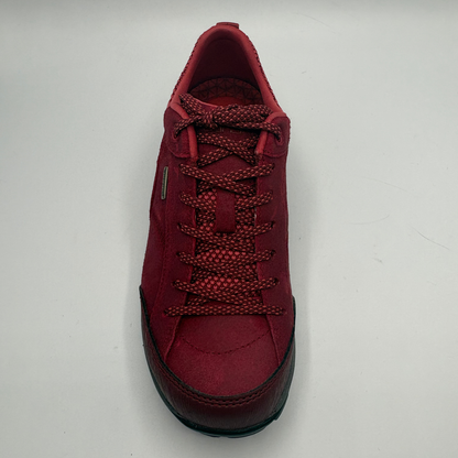 A red low-top sneaker shown from the top on a white background.