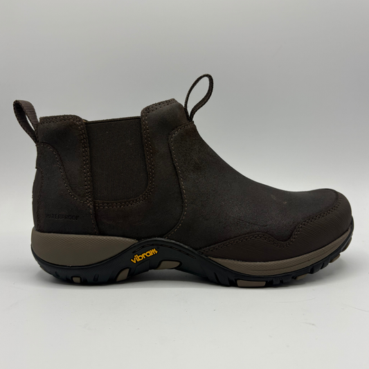 Right facing view of a short brown boot with two pull tabs and a contoured outsole