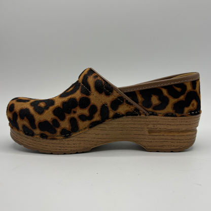 Left facing view of a leopard print clog