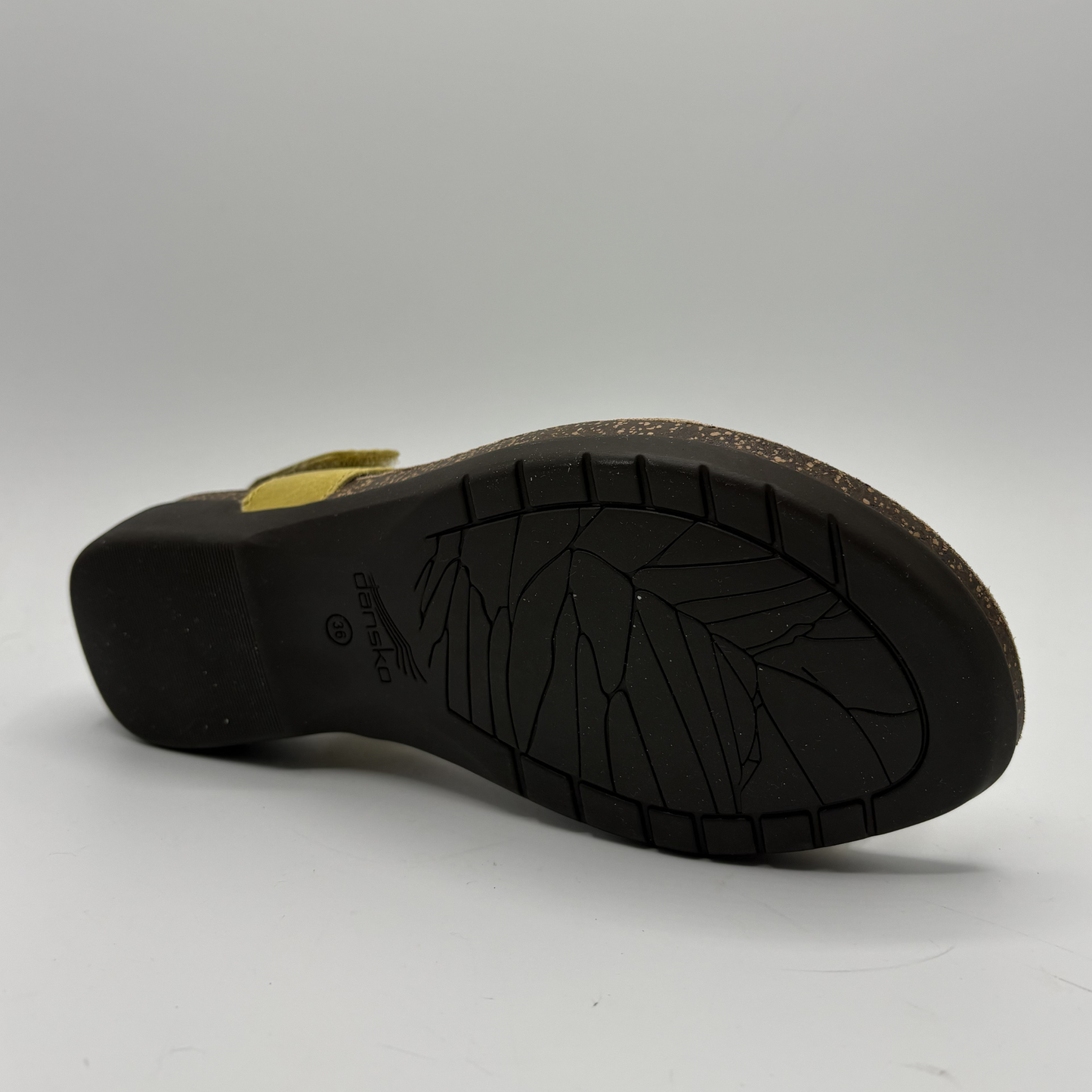Black sandal sole with brand logo on a white background