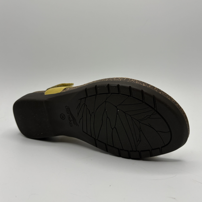 Black sandal sole with brand logo on a white background