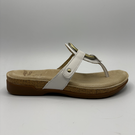 Beige sandal with a brown sole on a white background