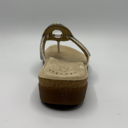 Brown sandal with cork sole on a white background