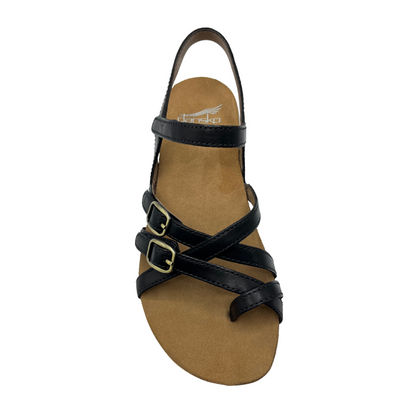 Top view of black leather and nubuck sandal with gold buckles and a cork and rubber outsole