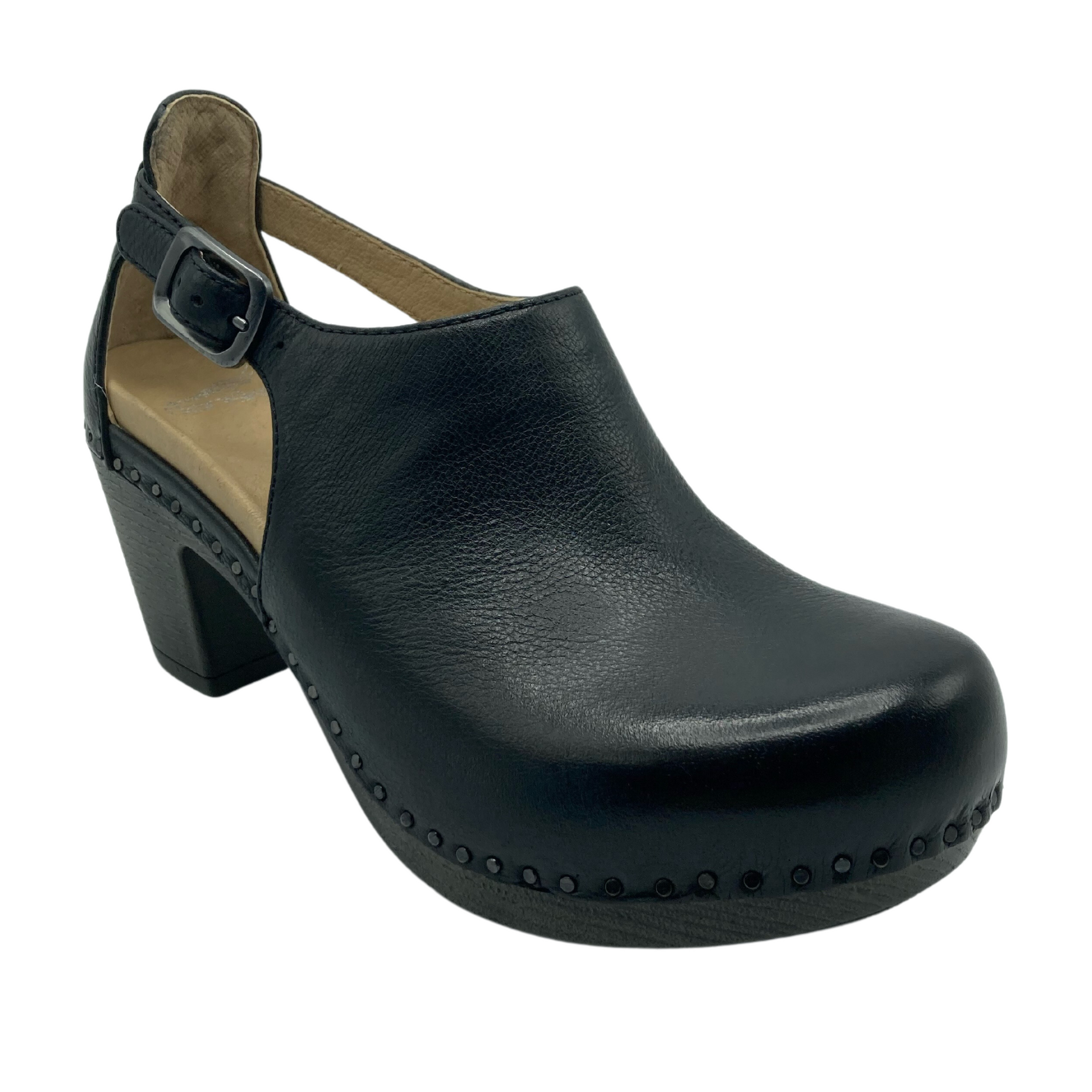 45 degree angled view of black leather clog with silver buckle detail and chunky heel