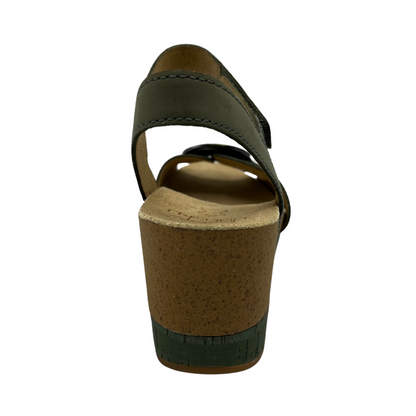 Back view of a nubuck and suede wedge sandal with adjustable velcro straps in a soft sage colour.