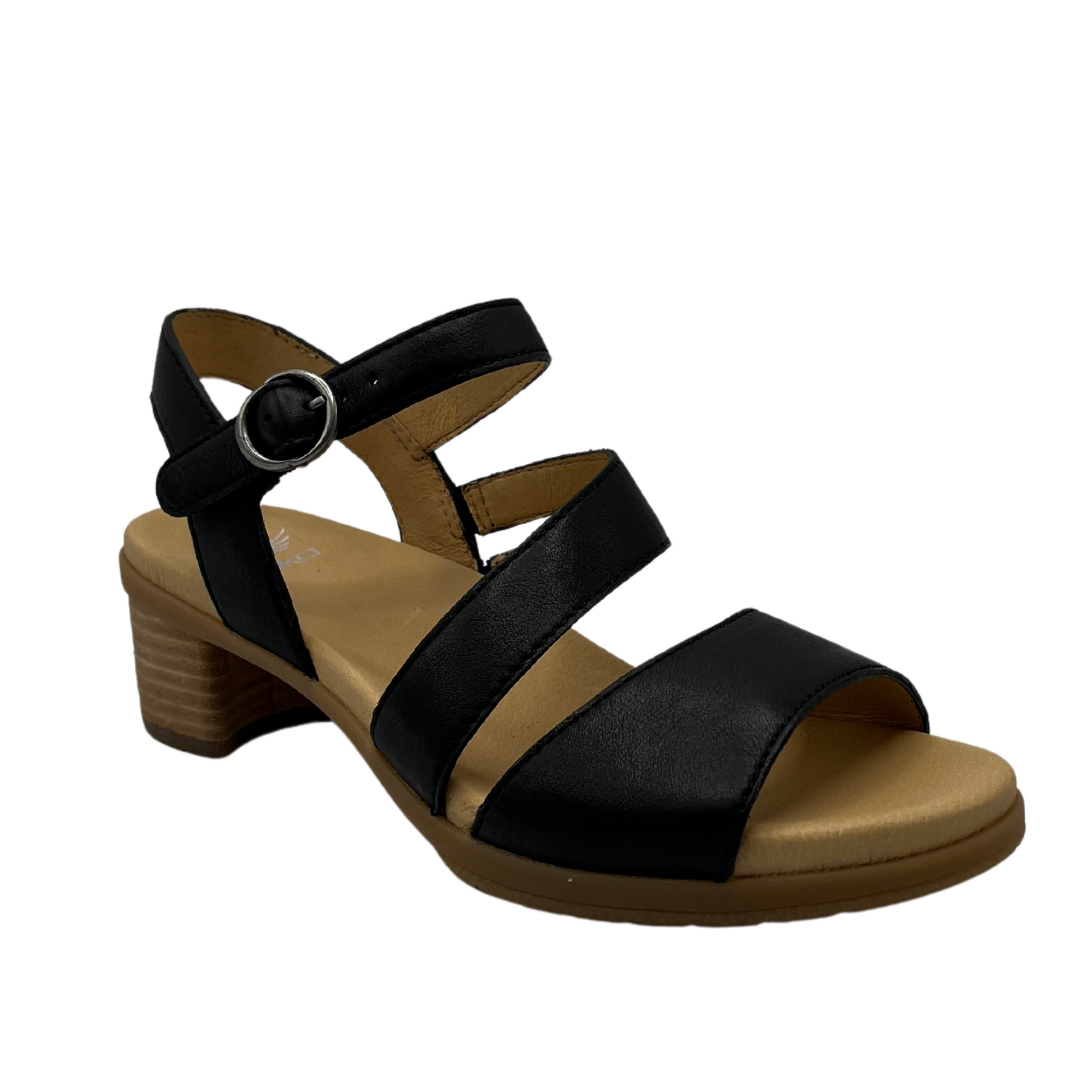 45 degree angled view of black leather sandal with leather lining and stacked heel