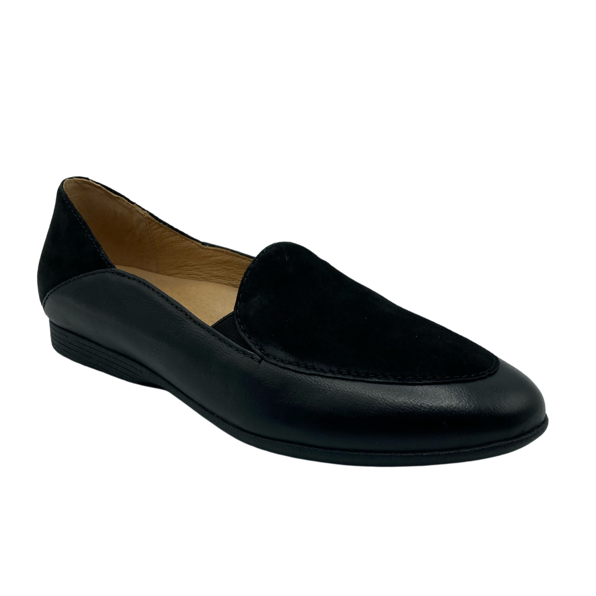 Angled view of black leather moc loafer with tan coloured inside