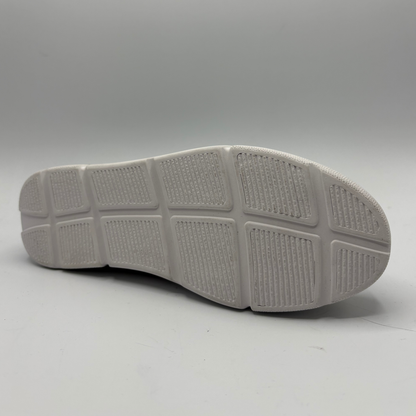 Gray shoe sole on a light gray background
