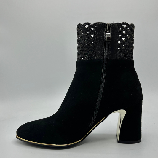 Left facing view of a black high heeled boot with shimmer detail