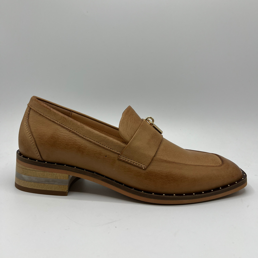 Right facing view of a tan leather loafer
