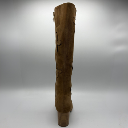 A tall brown suede knee-high boot with decorative cutout details and a stacked block heel, shown from the back on a light gray background.