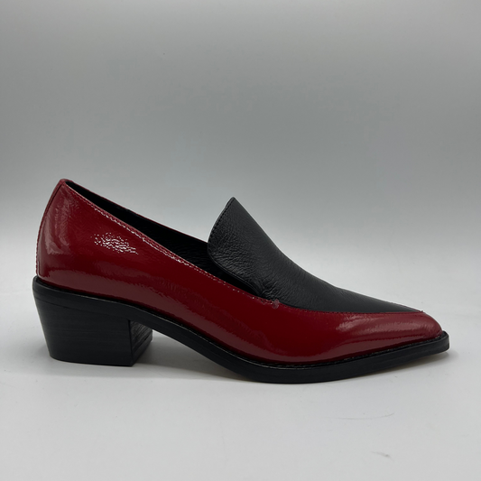 Red and black loafer shoe on a gray background