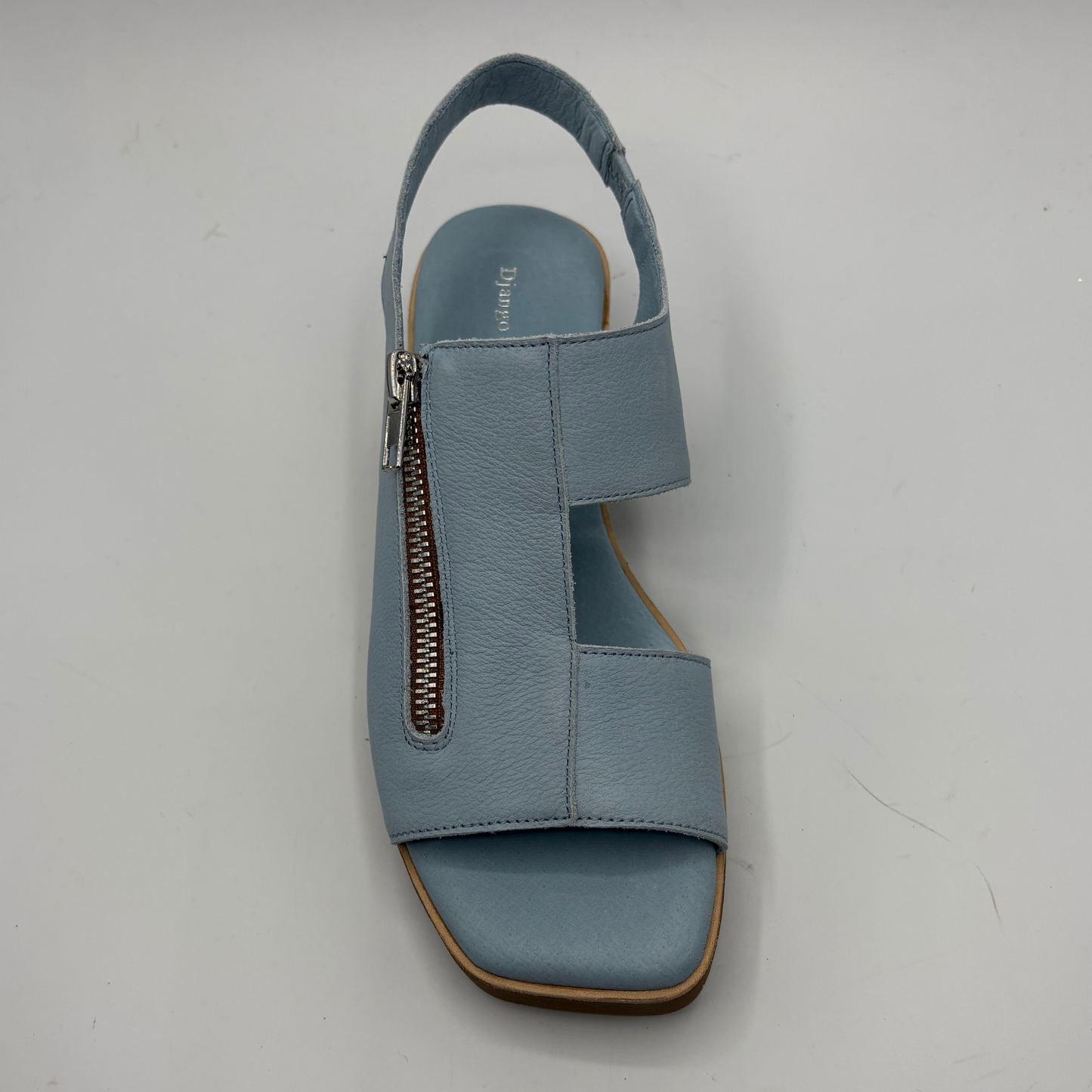 Blue sandal with a zipper on a light gray background