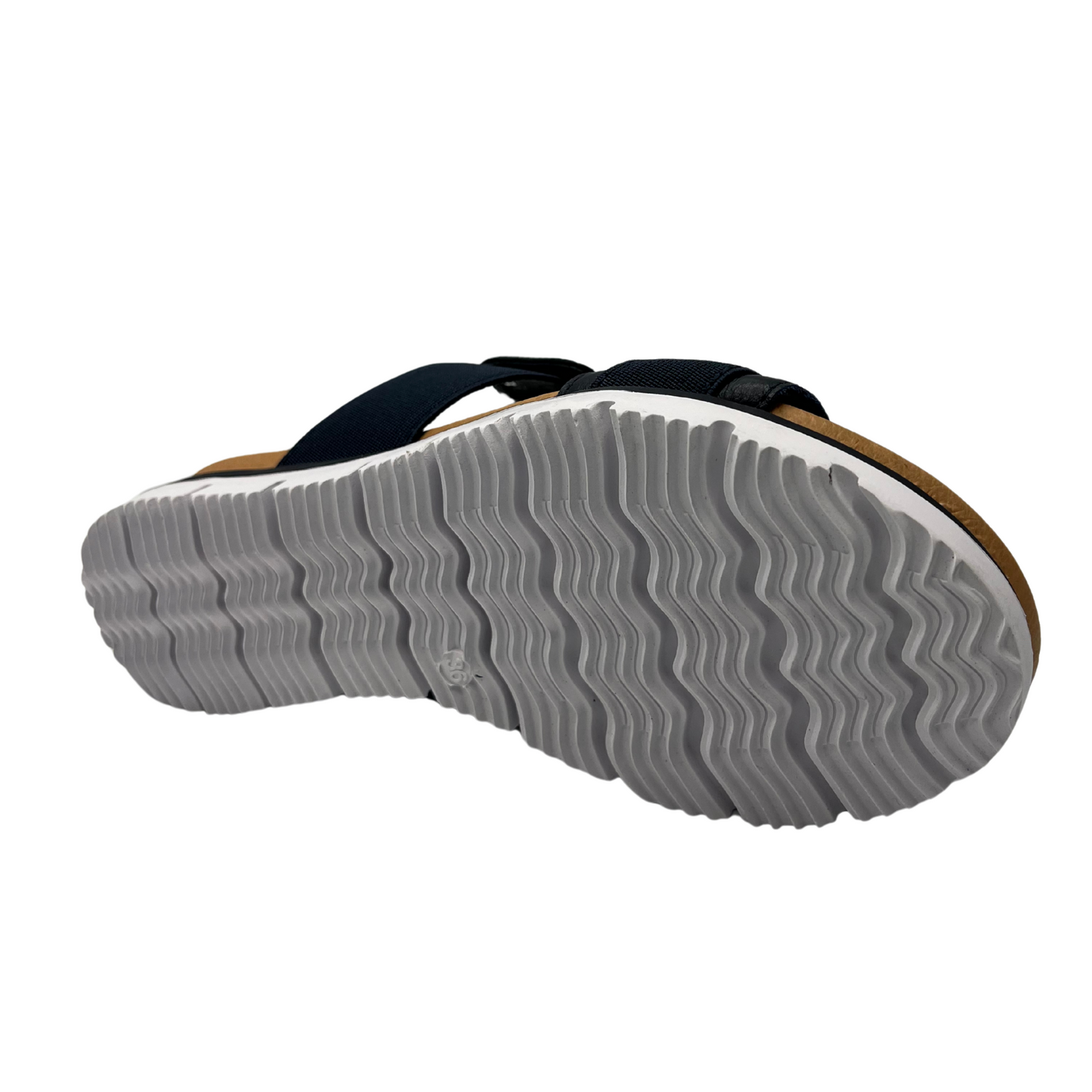 Bottom view of navy slip on sandal with a lightweight, flexible outsole.