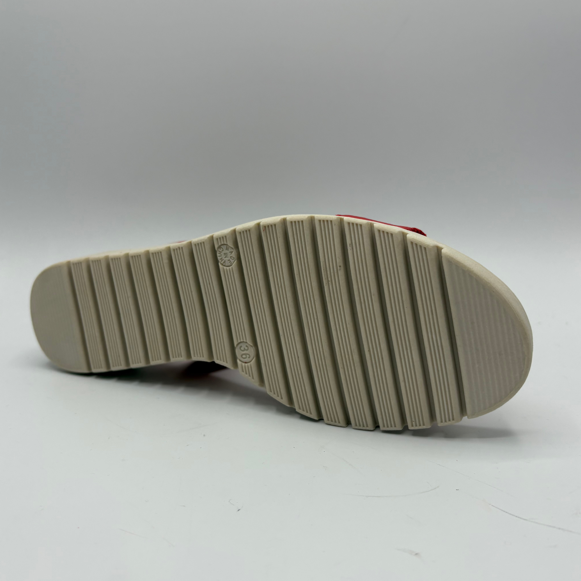 Beige sole of a shoe on a white background