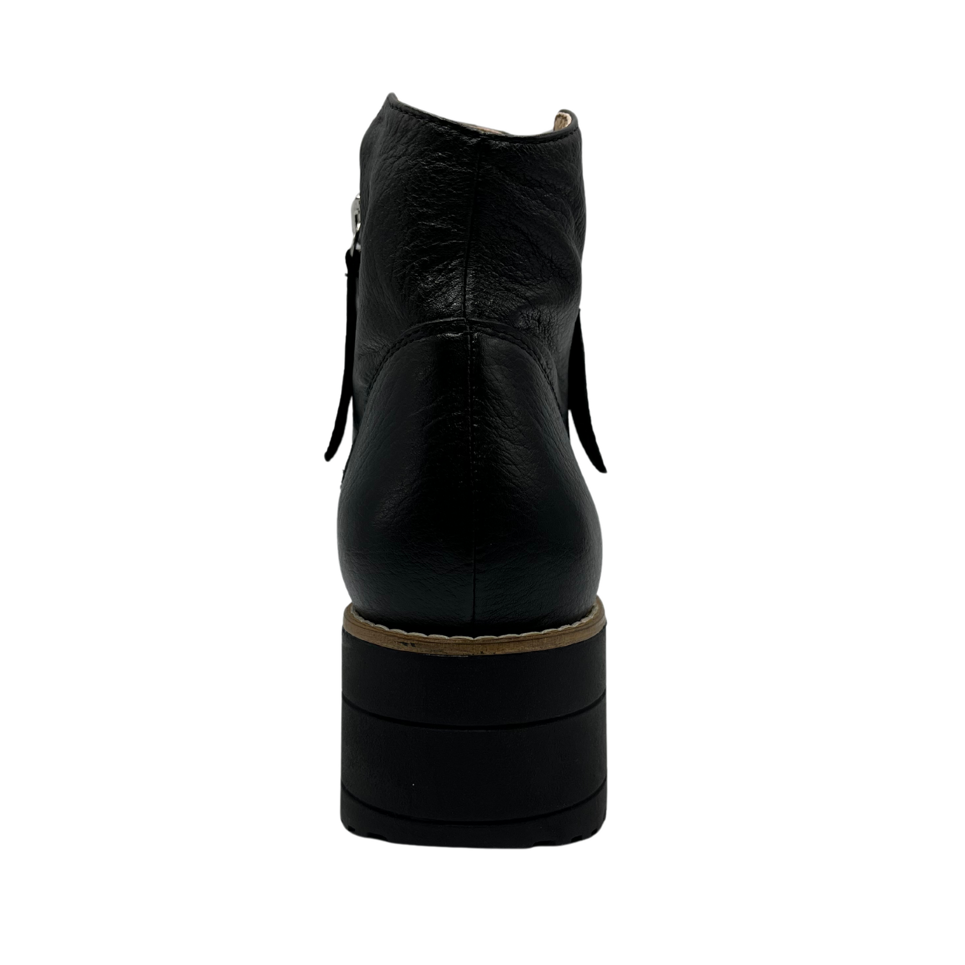 Back view of black leather short boot with black platform sole and double side zipper closures