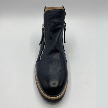 Black leather boot with a zipper on a white background