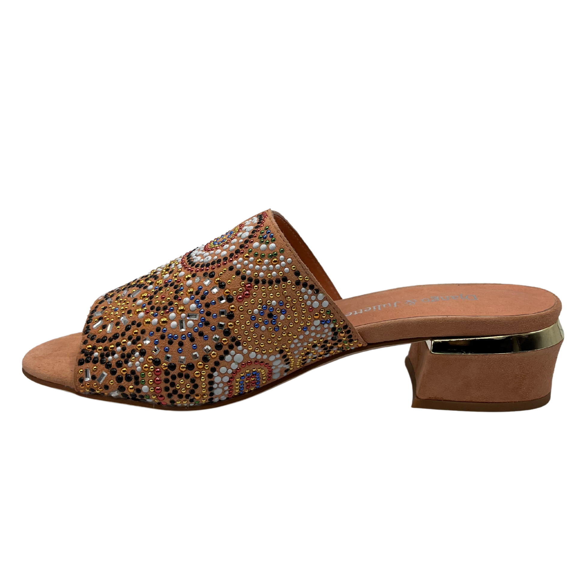 Left facing view of salmon coloured mule sandal with beaded detail on upper and block heel