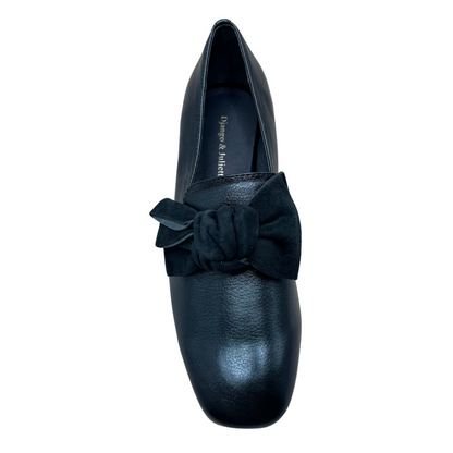 Top view of metallic blue leather heeled shoes with a velvet knotted bow detail and rounded toe