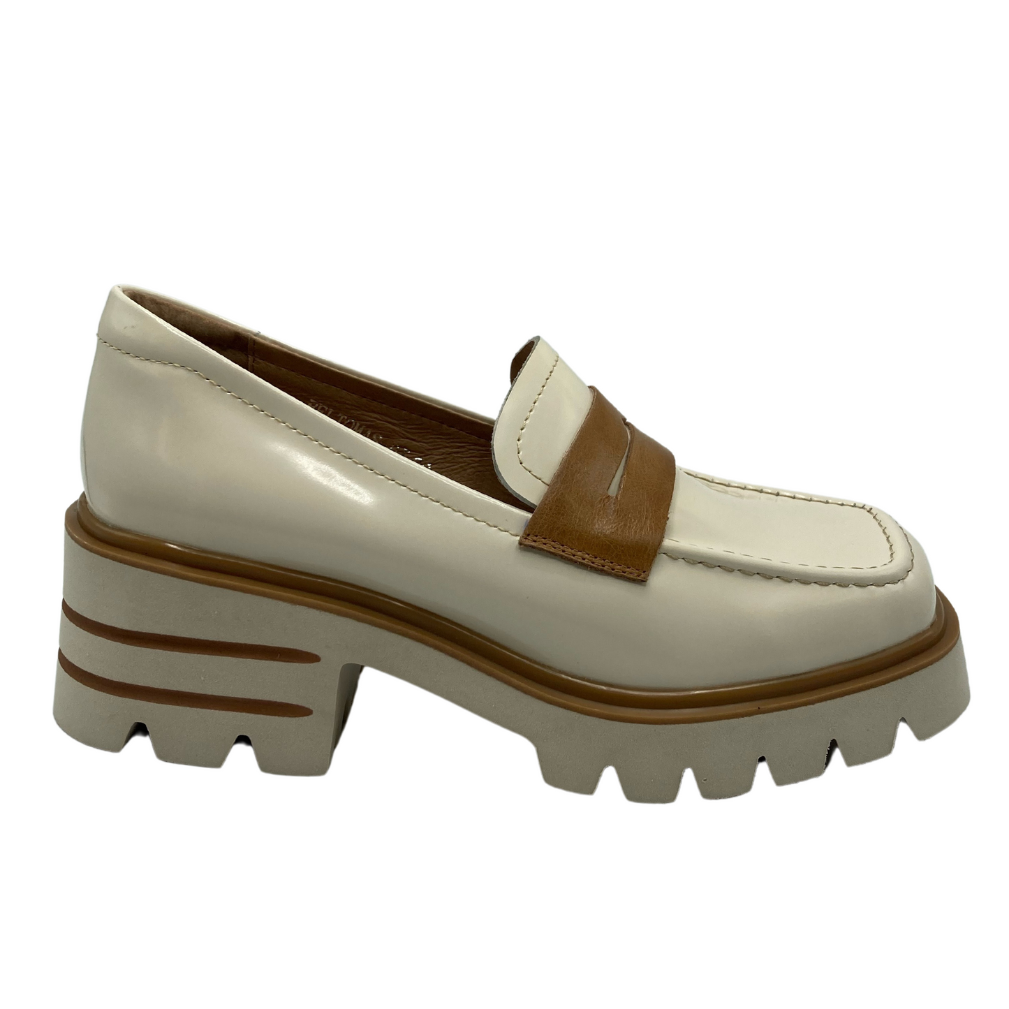 Right facing view of vanilla coloured block lheeled loafer with tan details on upper and heel