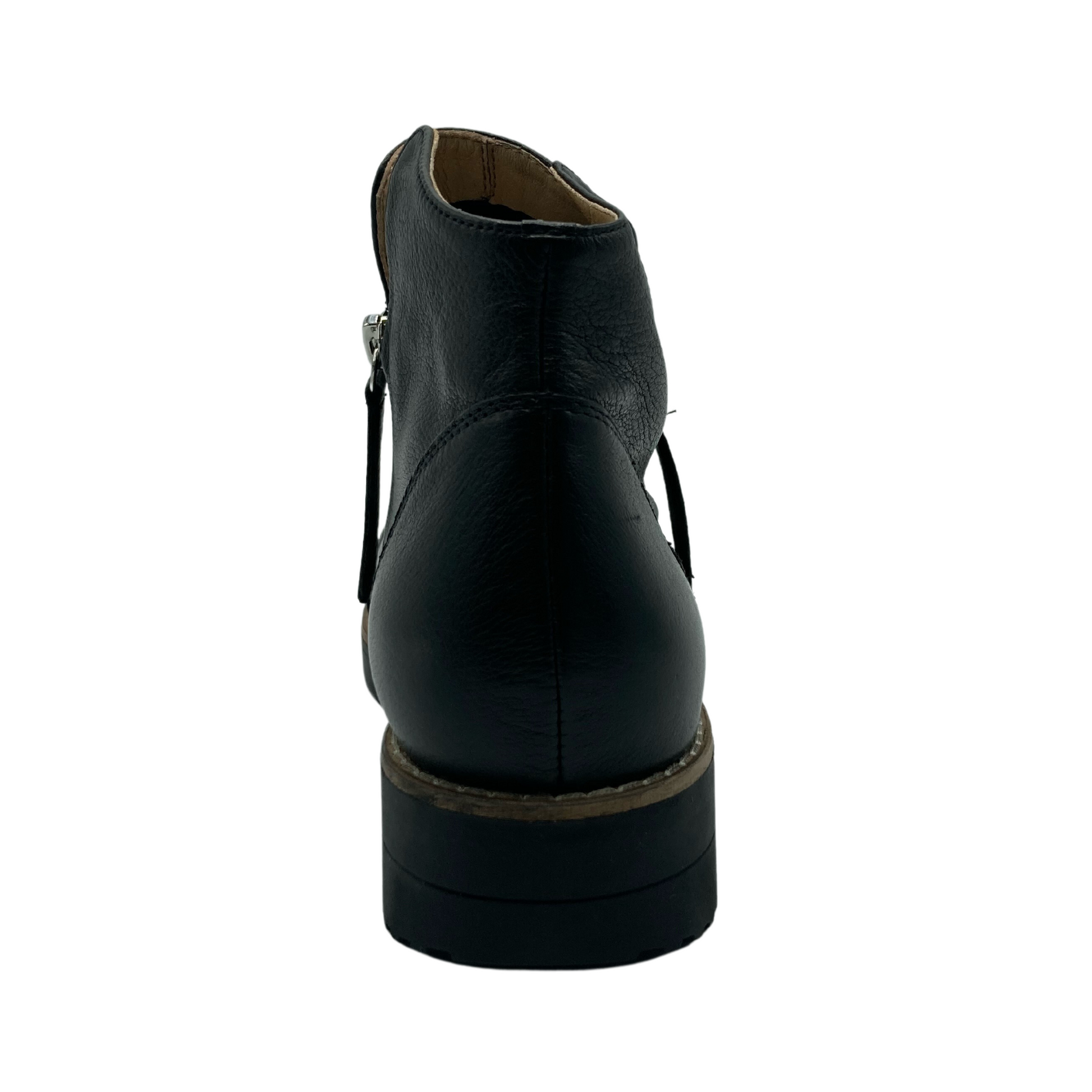 Hind view of a short black leather boot with two zippers and black rubber sole