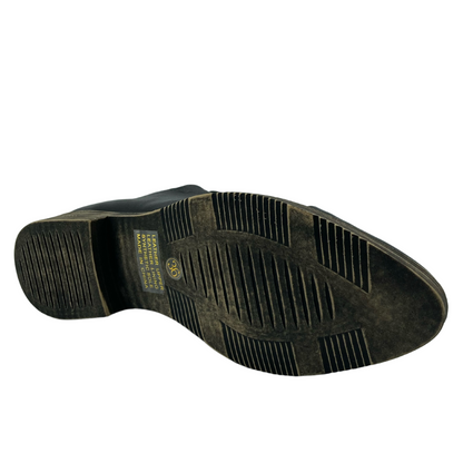 View of the bottom rubber sole of the shoe