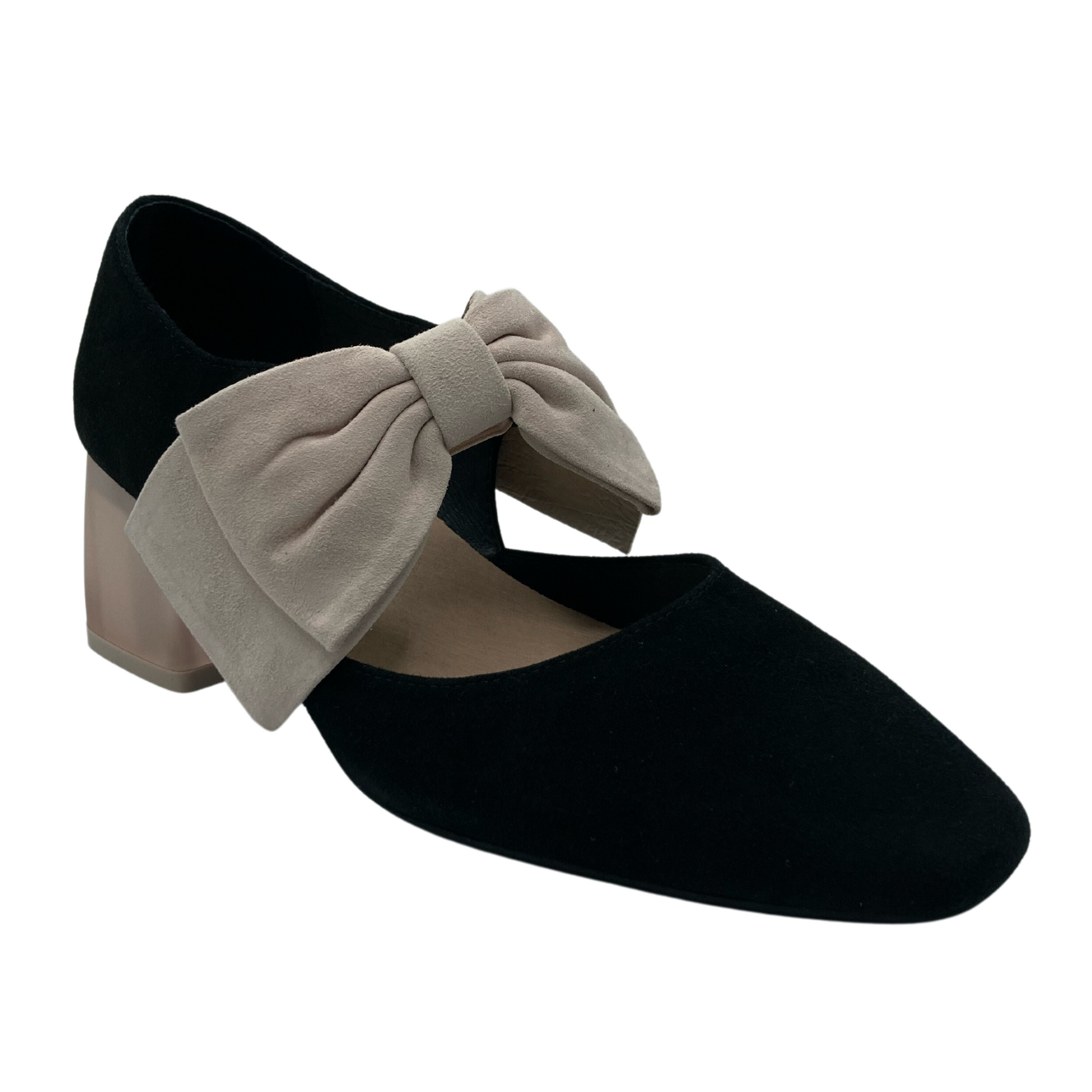 45 degree angled view of soft black mary jane shoe with cream coloured bow and lucite heel