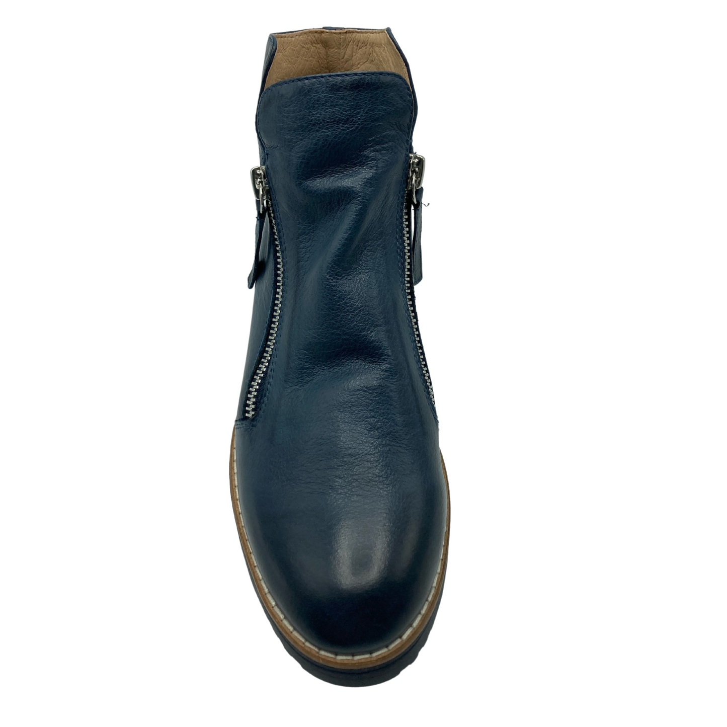 Top view of blue leather boot with rounded toe and a zipper on either side of the ankle