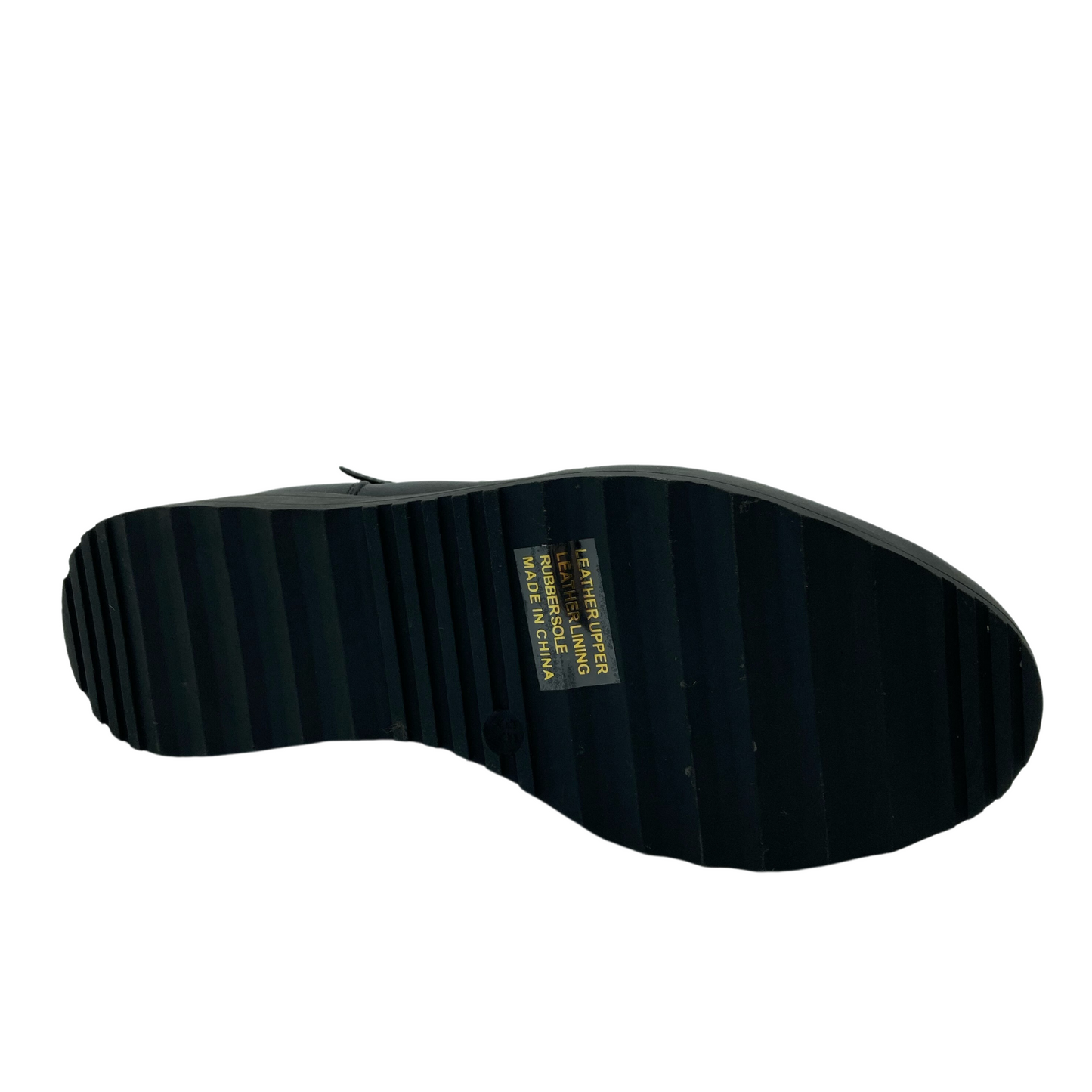 Bottom view of platform boot with black rubber sole