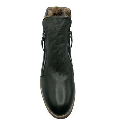 Top view of rounded toe leather boot with double zipper closure and leopard print fur lining
