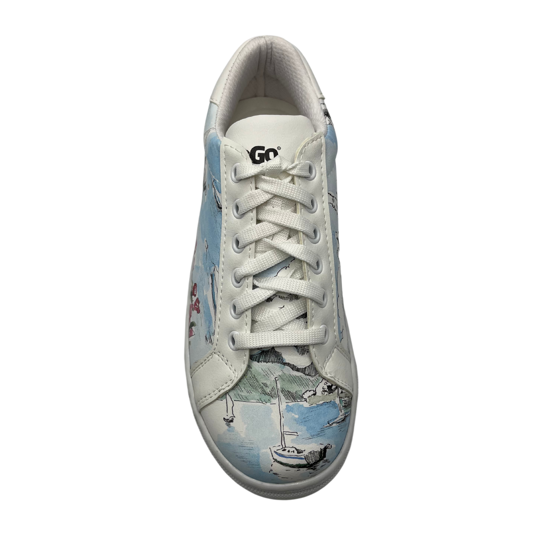 Top view of a white sneaker wrapped in beautiful artwork inspired by Lake Como, Italy. White rubber outsole, white laces and a padded collar.