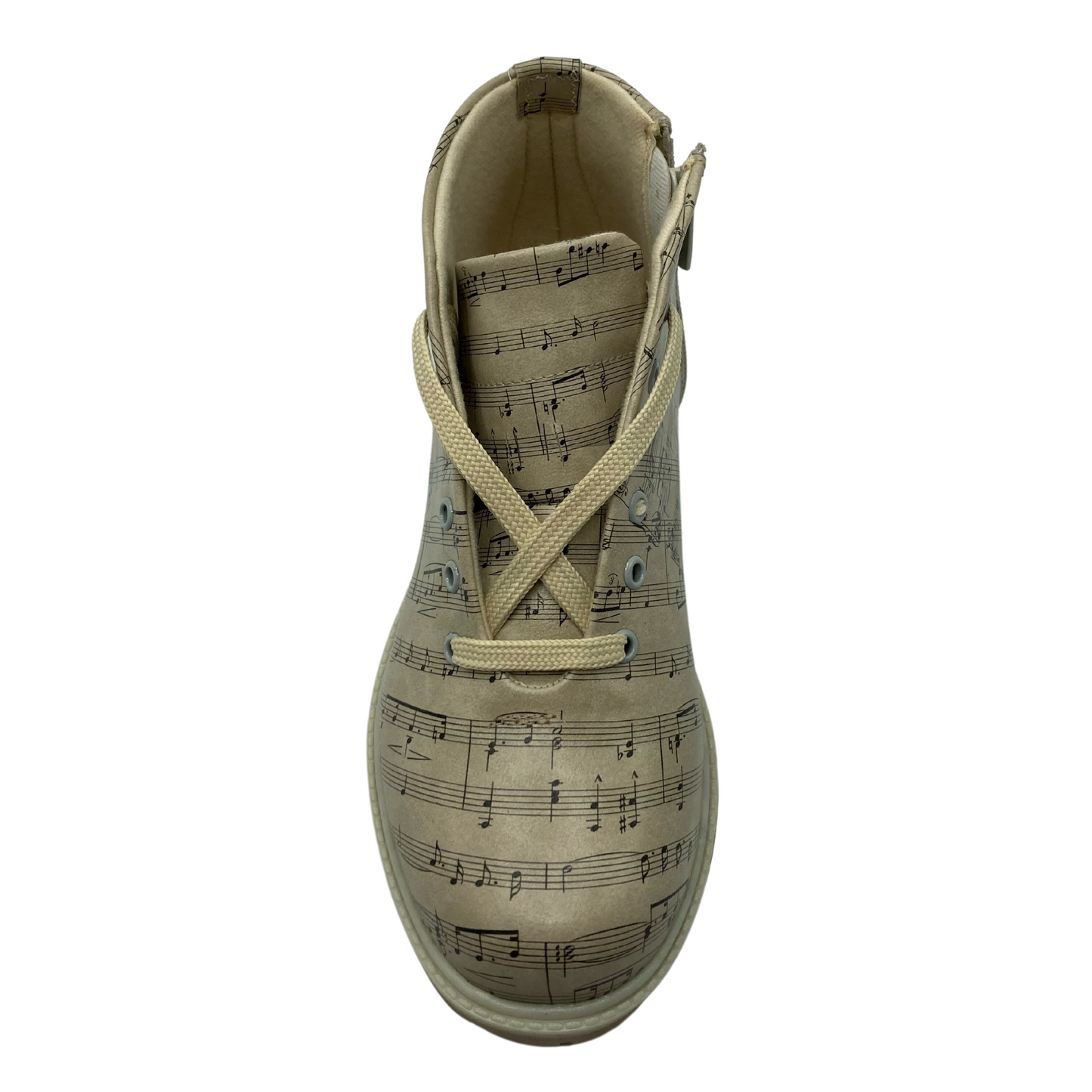 Top view of vegan leather short boot with sheet music pattern on upper and cream coloured laces