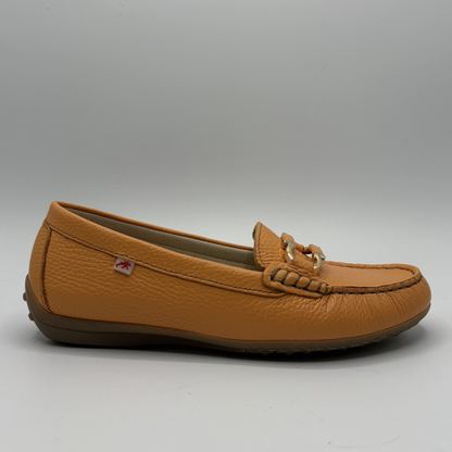 Brown loafer shoe on a gray background