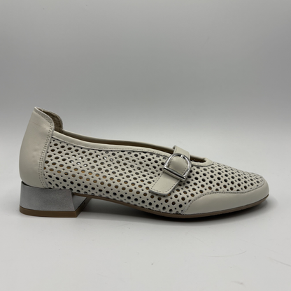 Beige shoe with perforated design and buckle on a white background