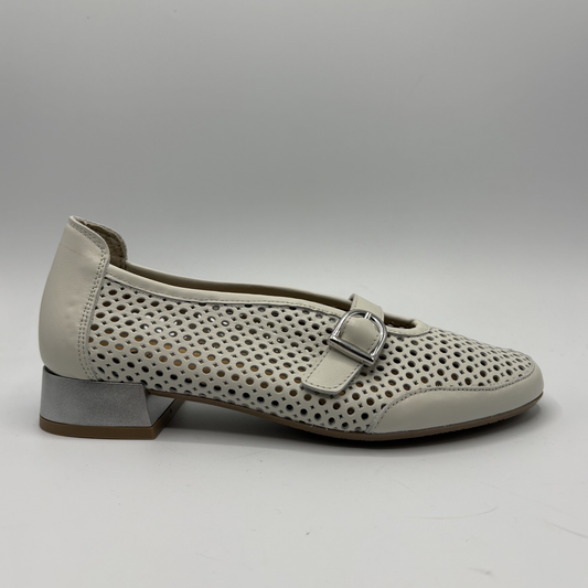 Beige shoe with perforated design and buckle on a white background