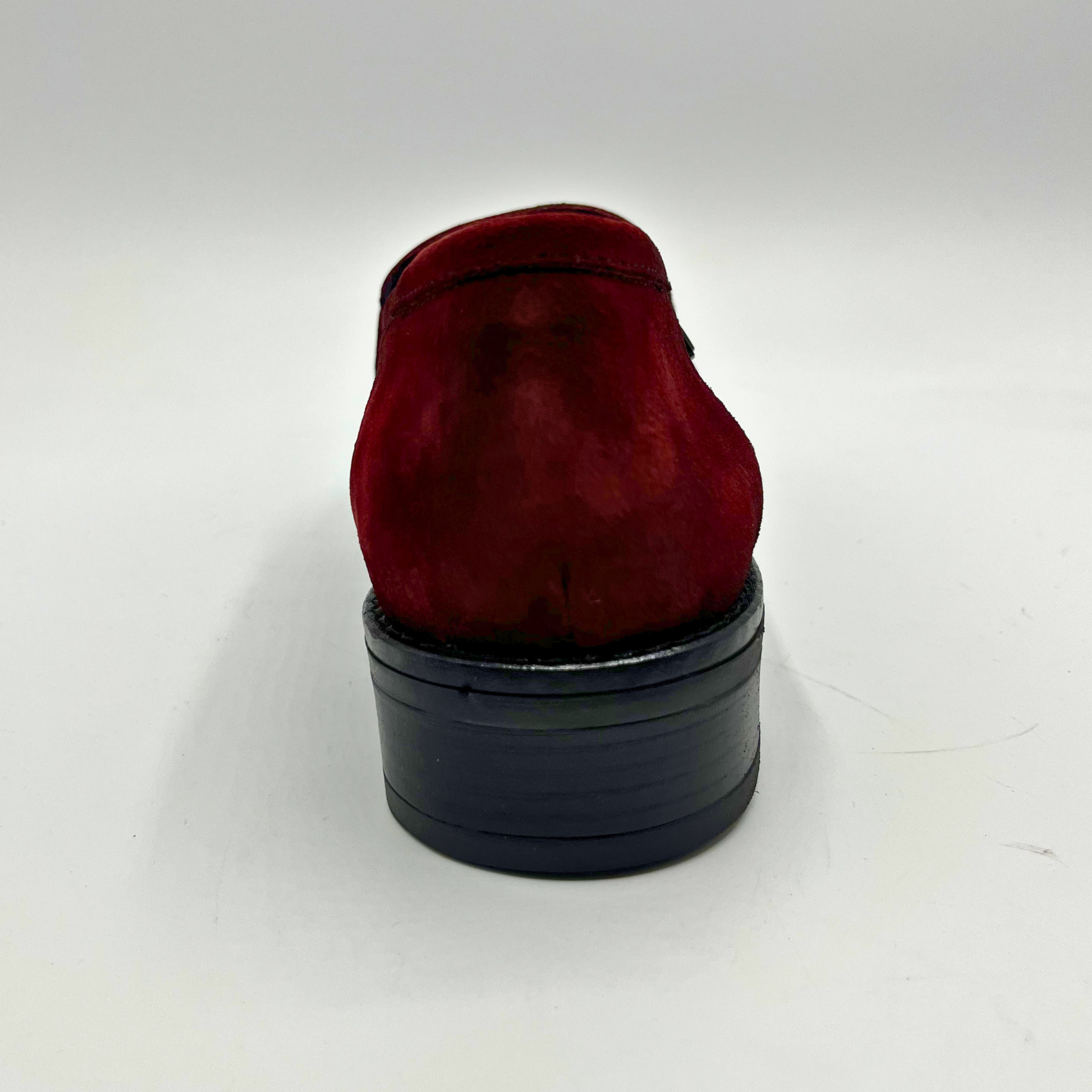 Red loafer shoe on a white background