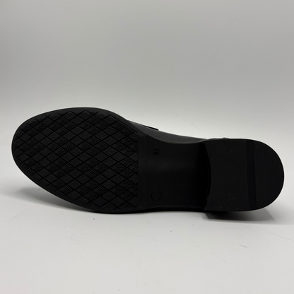 Black shoe sole on a white background
