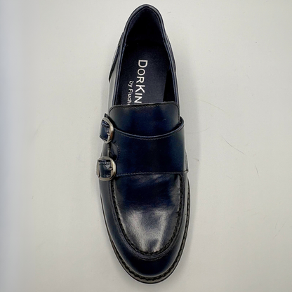 Top view of a blue leather loafer with two silver buckles