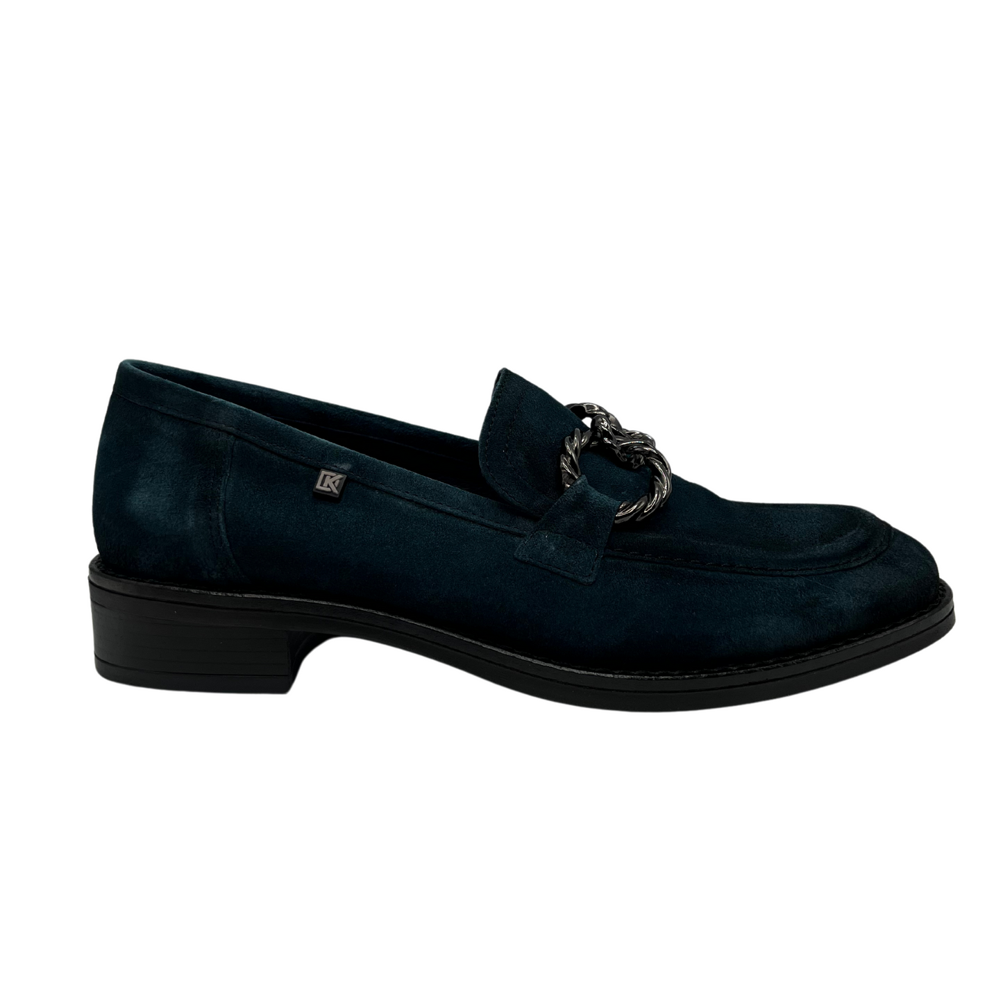 Right facing view of blue suede loafer with short block heel and metal embellishment on the upper