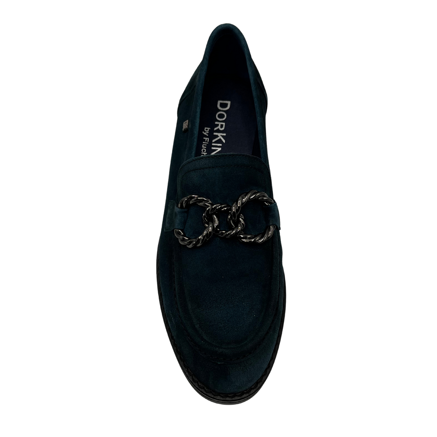 Top view of blue suede loafer with short block heel and metal embellishment on the upper