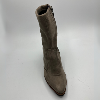 Taupe coloured boot on a white background