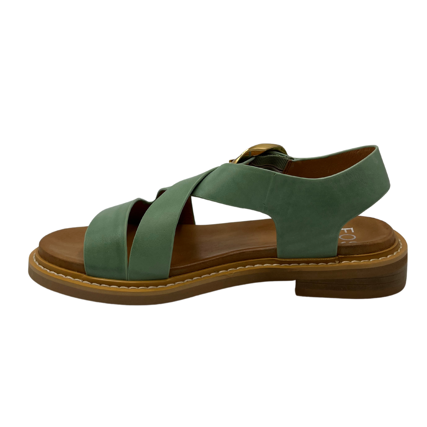 Left facing view of basil coloured leather sandal with low heel and buckle closure