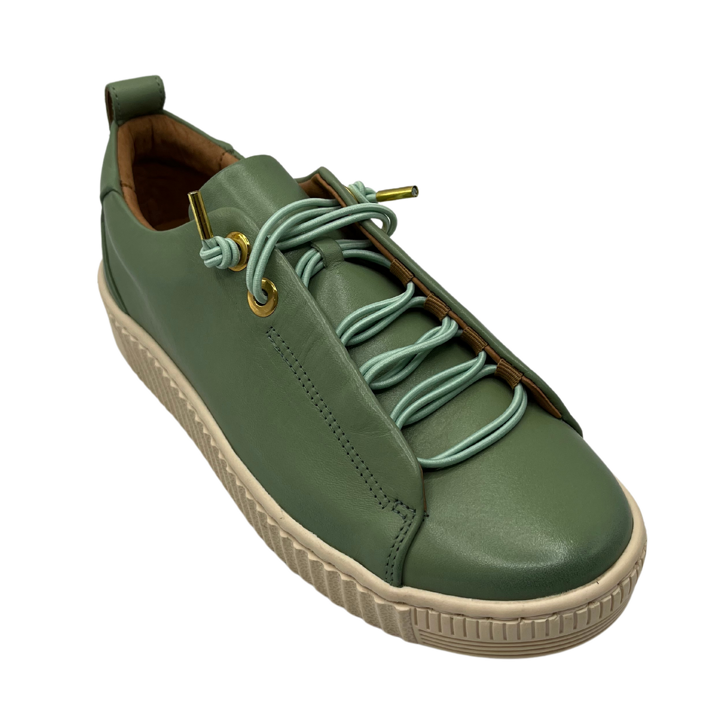 45 degree angled view of basil green leather sneaker with off white rubber outsole with matching laces 