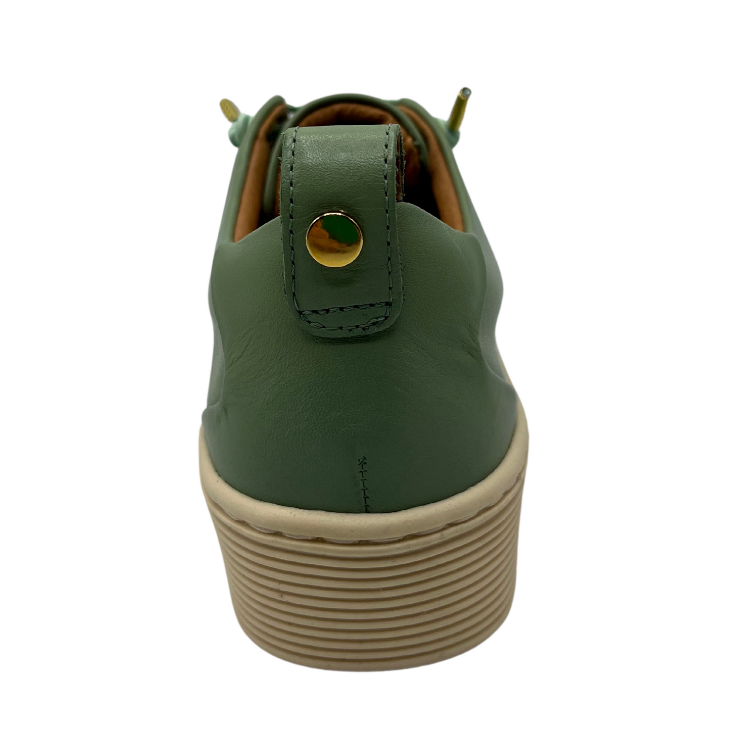 Back view of green leather sneaker with beige rubber outsole