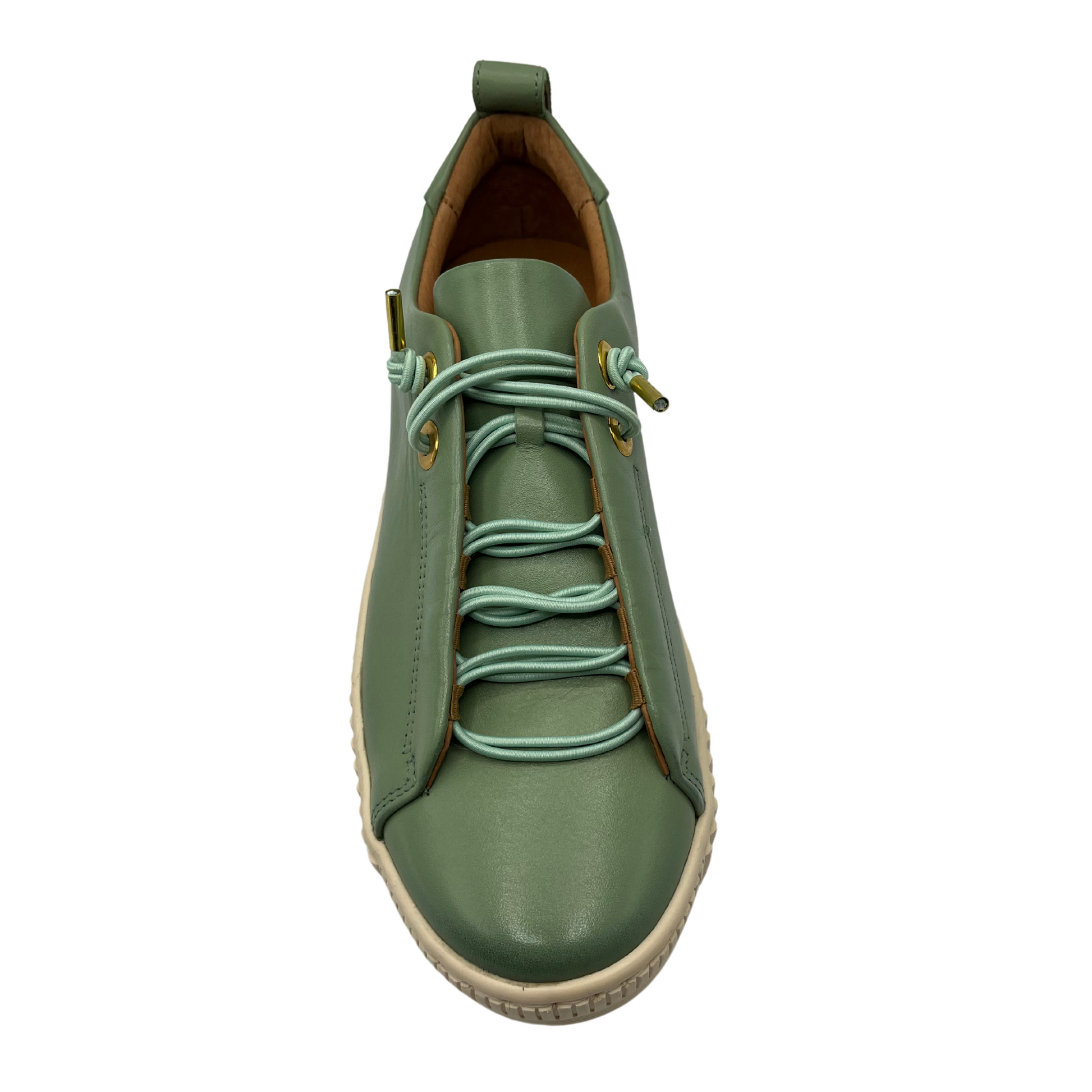 Top view of green leather sneaker with rounded toe and off white rubber outsole