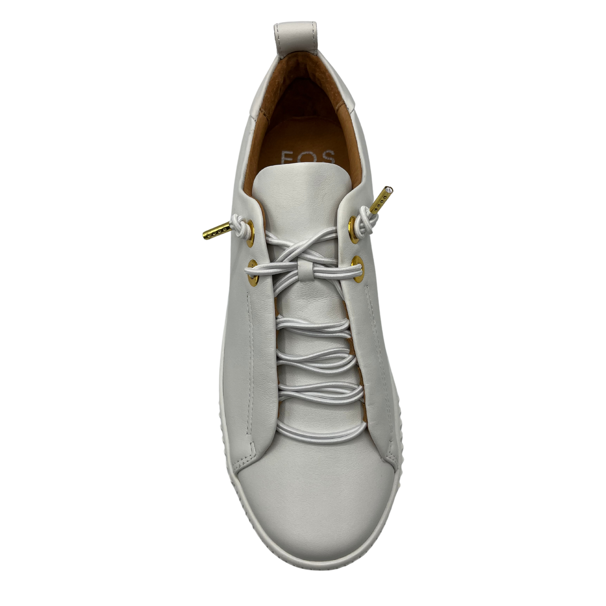 Top view of white leather sneaker with matching laces and white rubber outsole