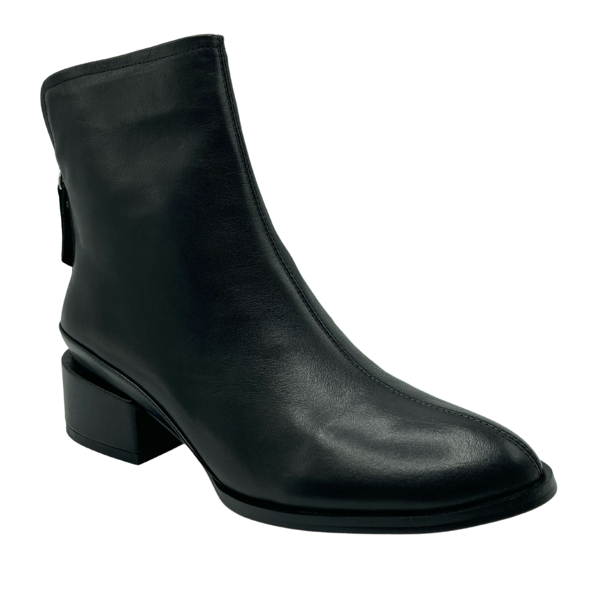 45 degree angled view of black leather ankle boot with block heel and almond toe