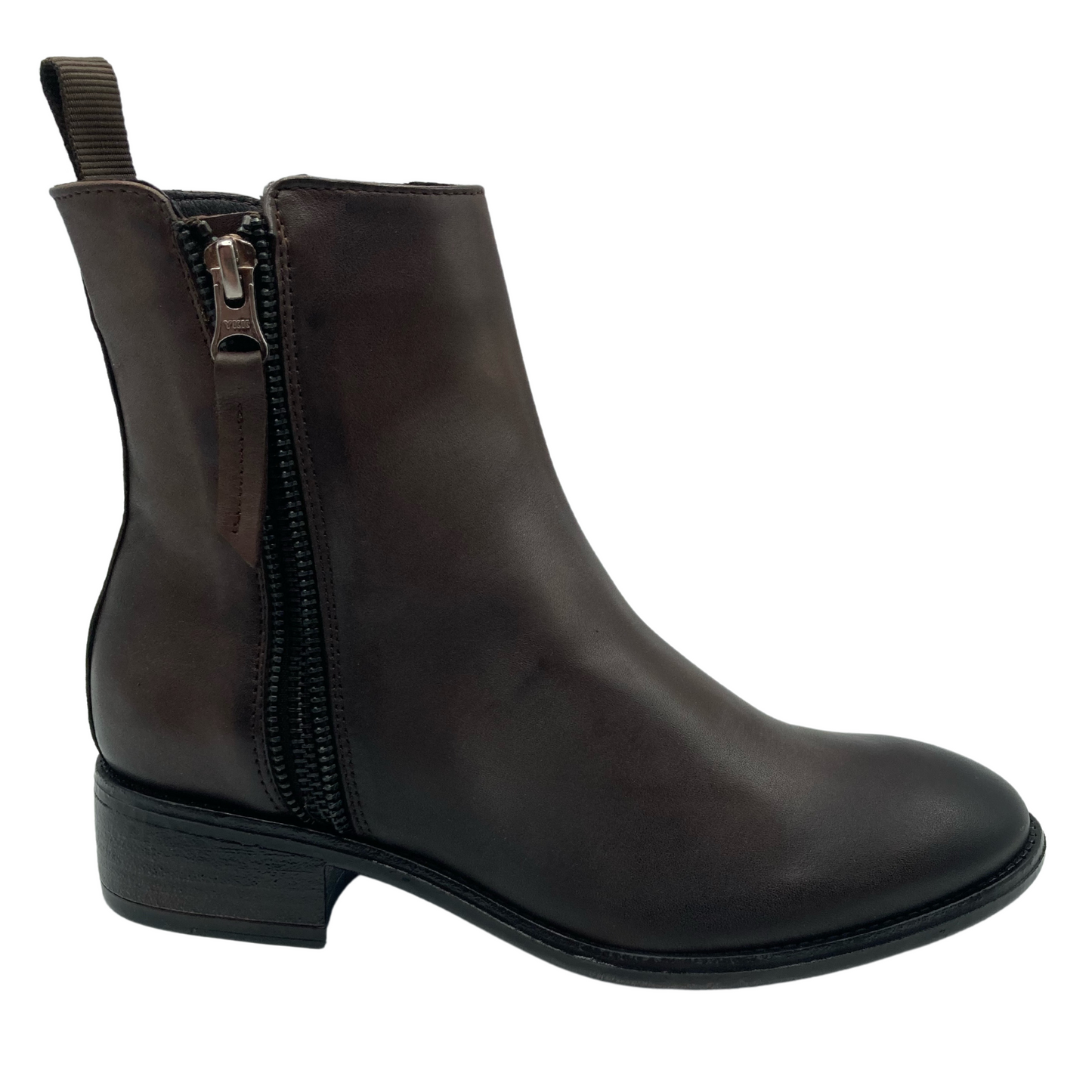 Right facing view of brown leather boot with zipper closure, brown pull tab and block heel